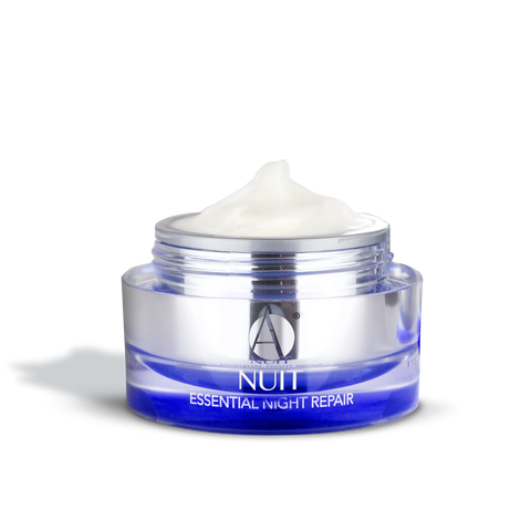 ANJALI MD Brightening Retinol Night Cream pictures ontop of a cream smear