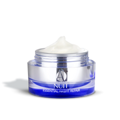 ANJALI MD Brightening Retinol Night Cream pictures ontop of a cream smear