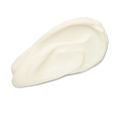 This light cream with a hint of a tan yellow hue has a soft texture in this cream smear.