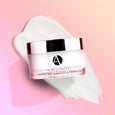 Heavenly Moisturizing Cream jar above a white cream smear on pink background