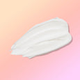 ANJALI MD Skincare Heavenly Moisturizing Cream smear on pink background