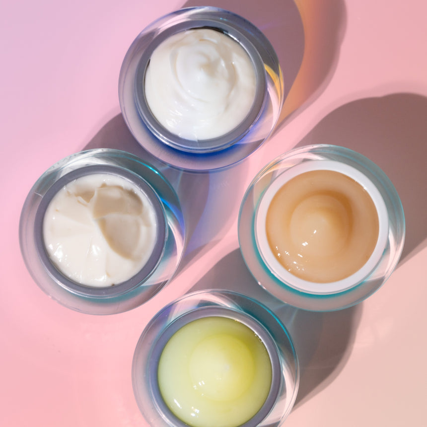 Skincare jars open, view from above