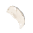 A horseshoe shaped light beige cream smear. Ultimate Eye repair is a smooth cream that is meant to be applied around the eyes.