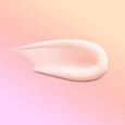Teen Acne Clarifying Lotion Smear - a light pinkish orange lotion