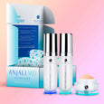 AMJALI MD Dark Spot Treatment System Essentials - Bodhi Brightening Cleanser, Rapid Brightening Serum and Dark Spot Eraser Mask in front of a blue shipping box